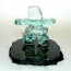 Wilton, Inukshuk mounted on chipped edge black granite base with engraving in Gold